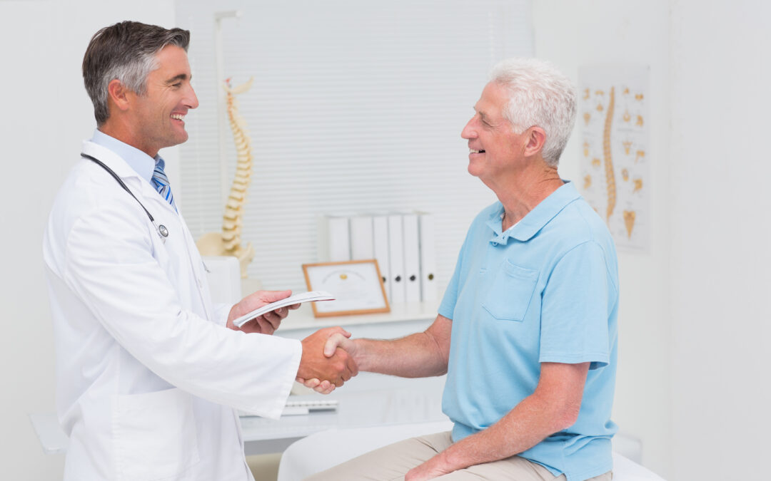 Patient happy with doctor after cervical and spondylitis treatment